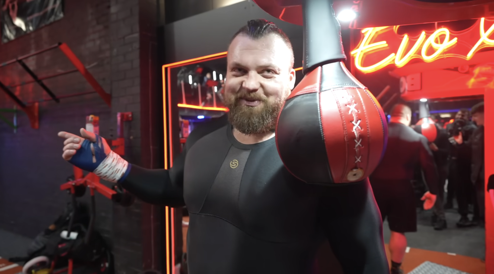 Watch a Strongman Try to Hit Harder Than a UFC Champion and Kickboxer