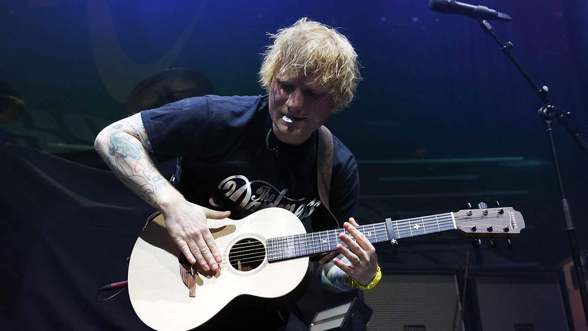 Ed Sheeran isn’t just a fingerpicker or a strummer – his ‘guitar orchestra’ approach sells out stadiums. Here’s how he does it
