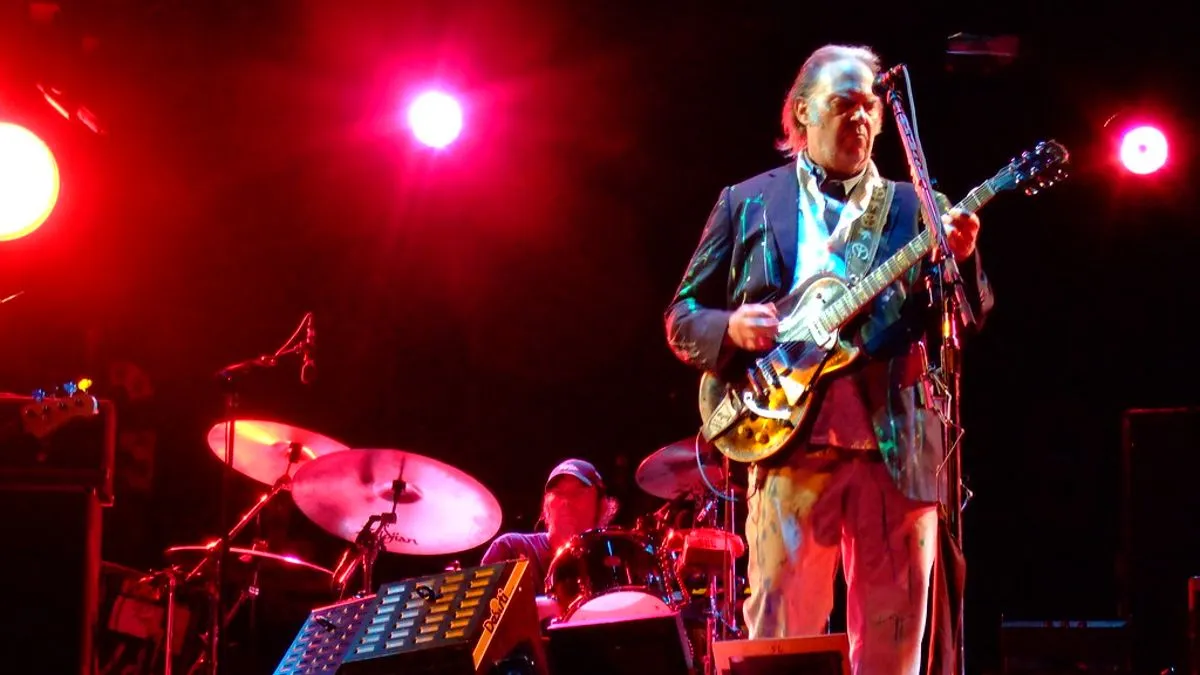 Neil Young Slinks Back Onto ‘Low Res Spotify’ — Ending Joe Rogan Boycott