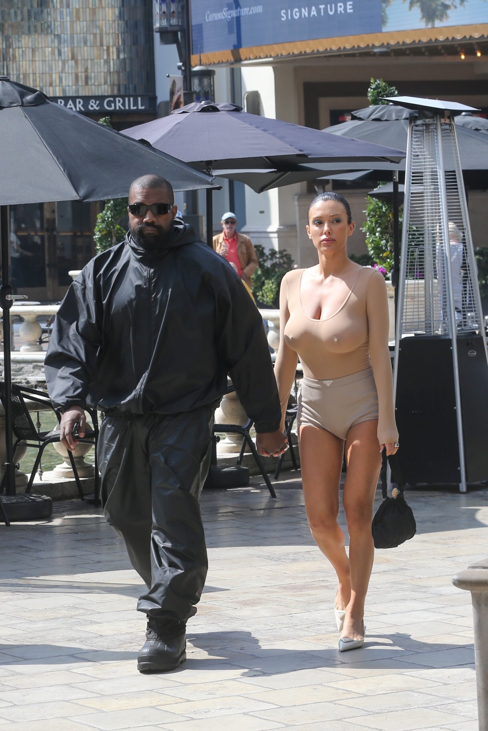 Bianca Censori wears sheer tights as a top for another Cheesecake Factory date with Kanye West