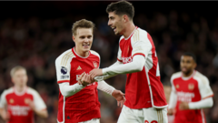 Arsenal return to top with victory over Luton